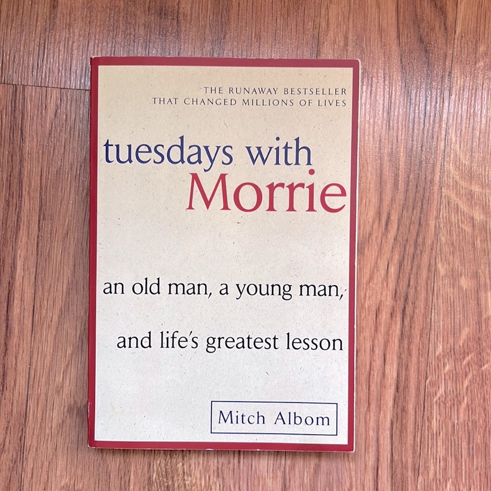Tuesdays with Morrie by Mitch Albom. Used condition, paper back.